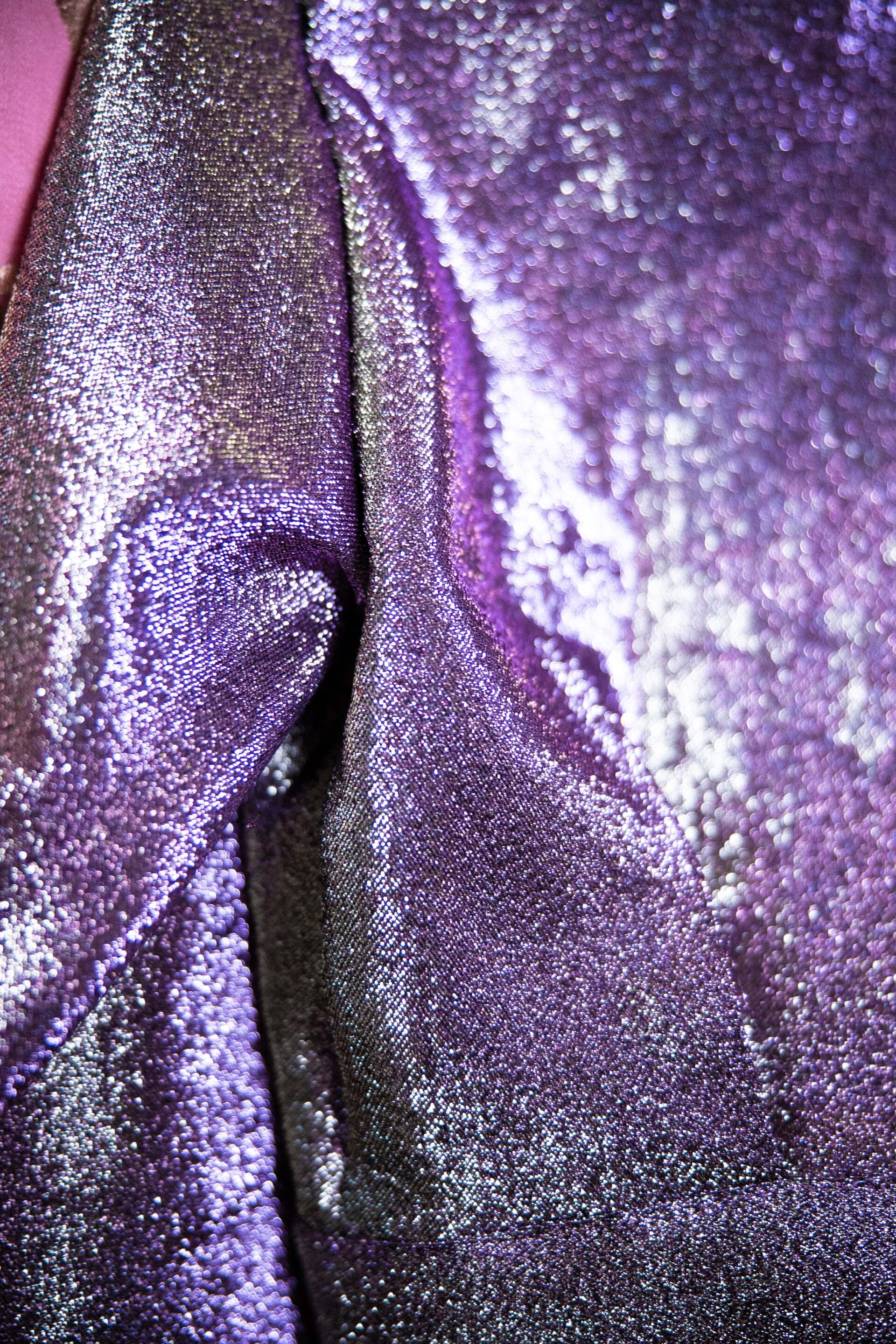 Metallic texture and shiny fabrics in AW21 fashion trends. Photo by Corina Rainer, Unsplash