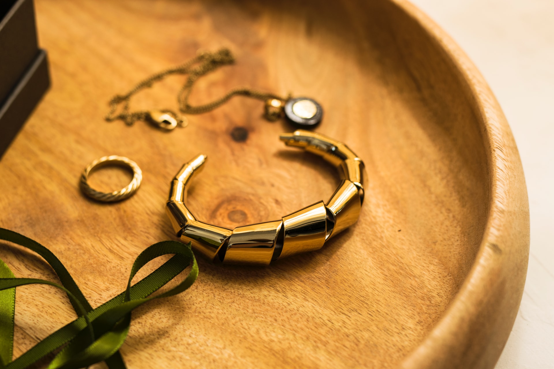 Gold jewellery on a tray