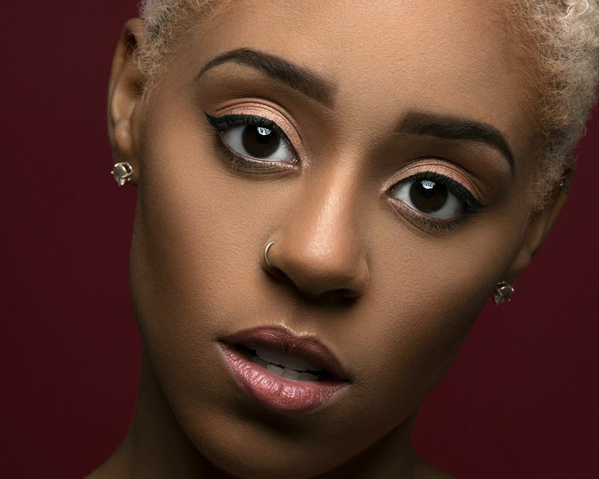 Black woman wearing makeup